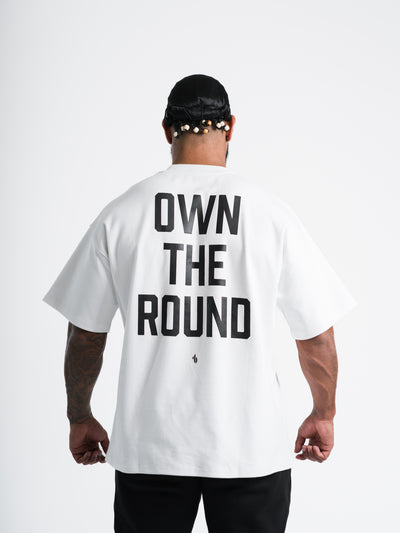 Male model wearing white One Bout OWN THE ROUND Oversized T-Shirt back view