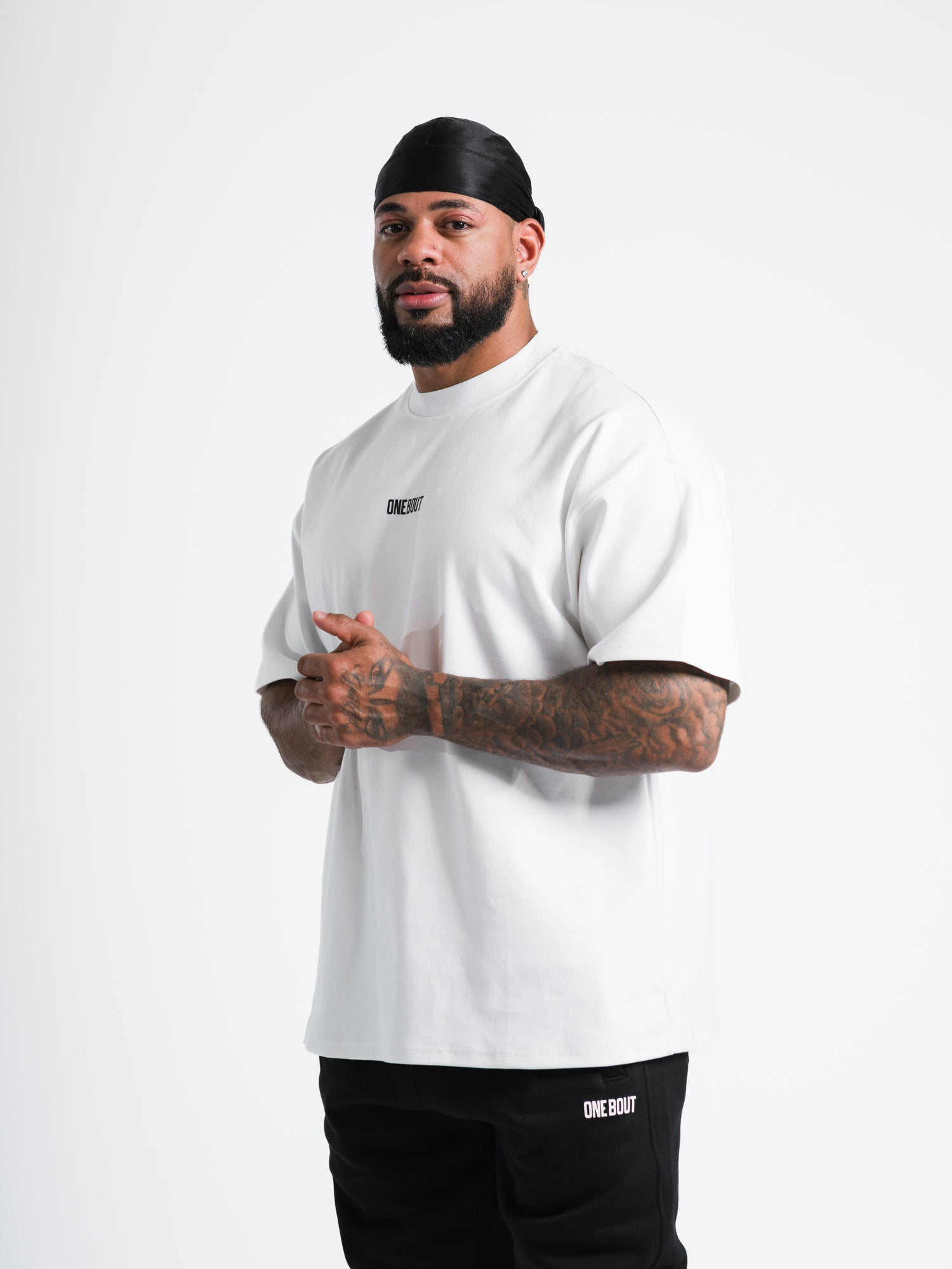 ONE BOUT Men's Own The Round Oversized T-Shirt in White — front view