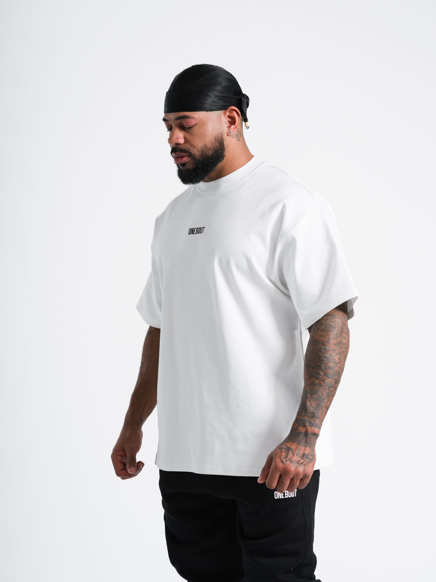 ONE BOUT Men's Own The Round Oversized T-Shirt in White — styled