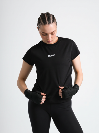 Female model wearing black One Bout Script T-Shirt (Limited)