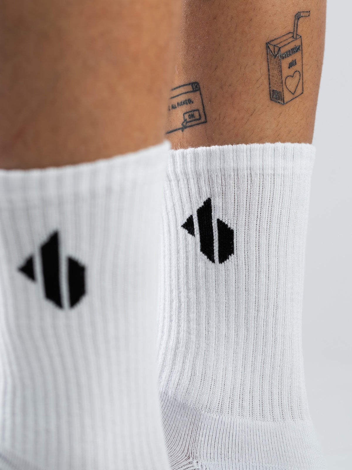 One Bout Crew Socks in white — woven logo detail